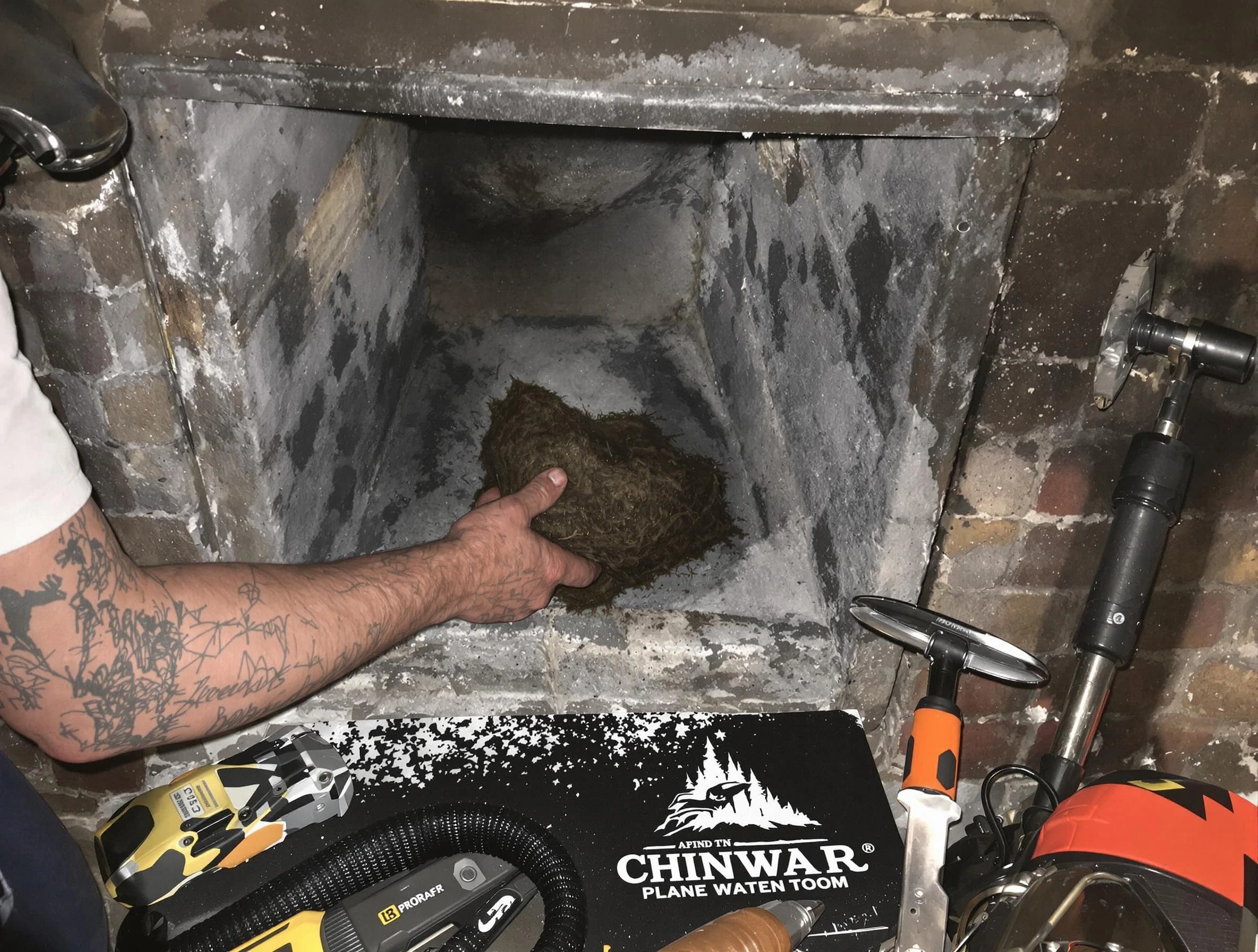 Peoria Chimney Sweep safely removing debris and screening chimney in Peoria, AZ