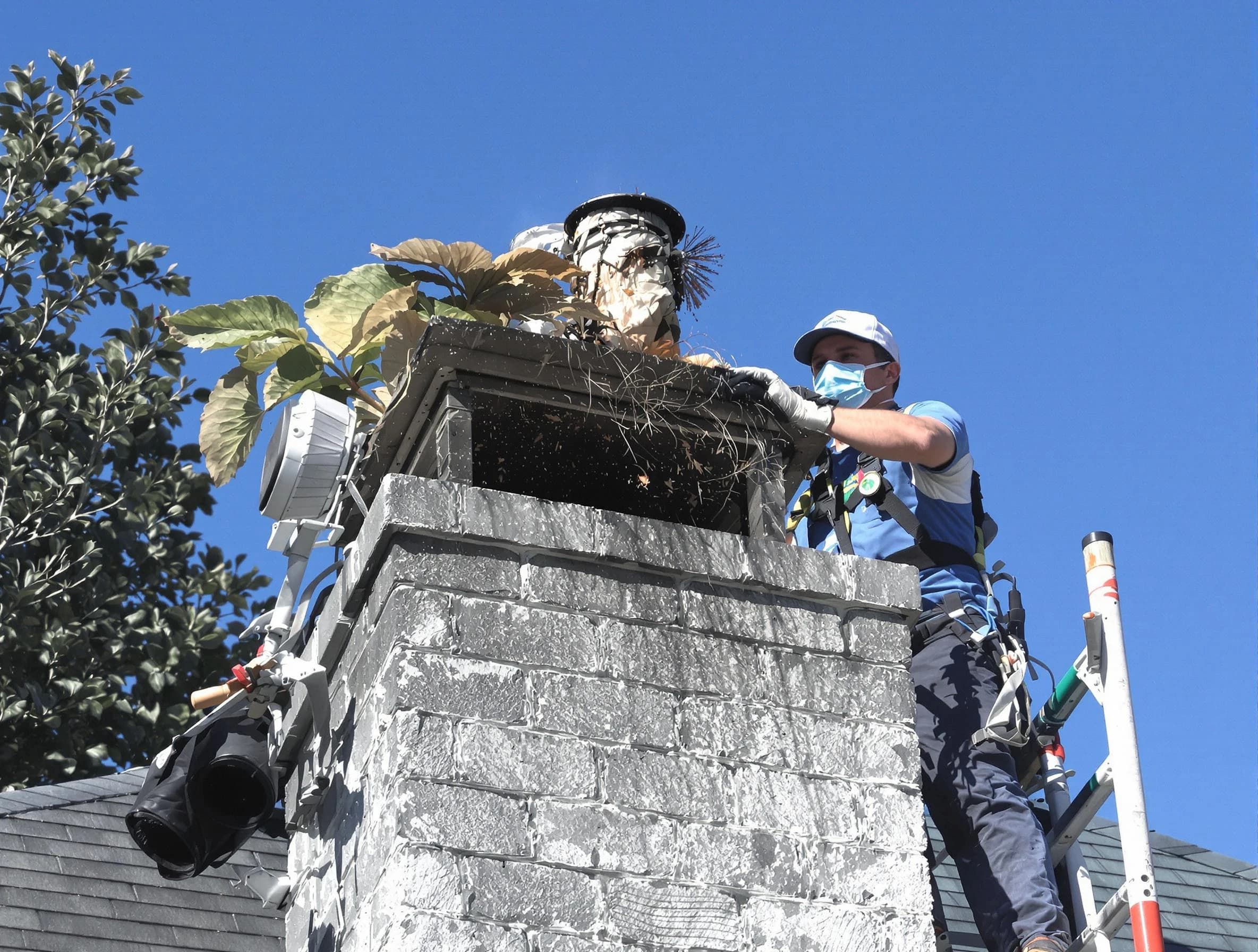 Peoria Chimney Sweep specialist performing chimney cleaning in Peoria, AZ