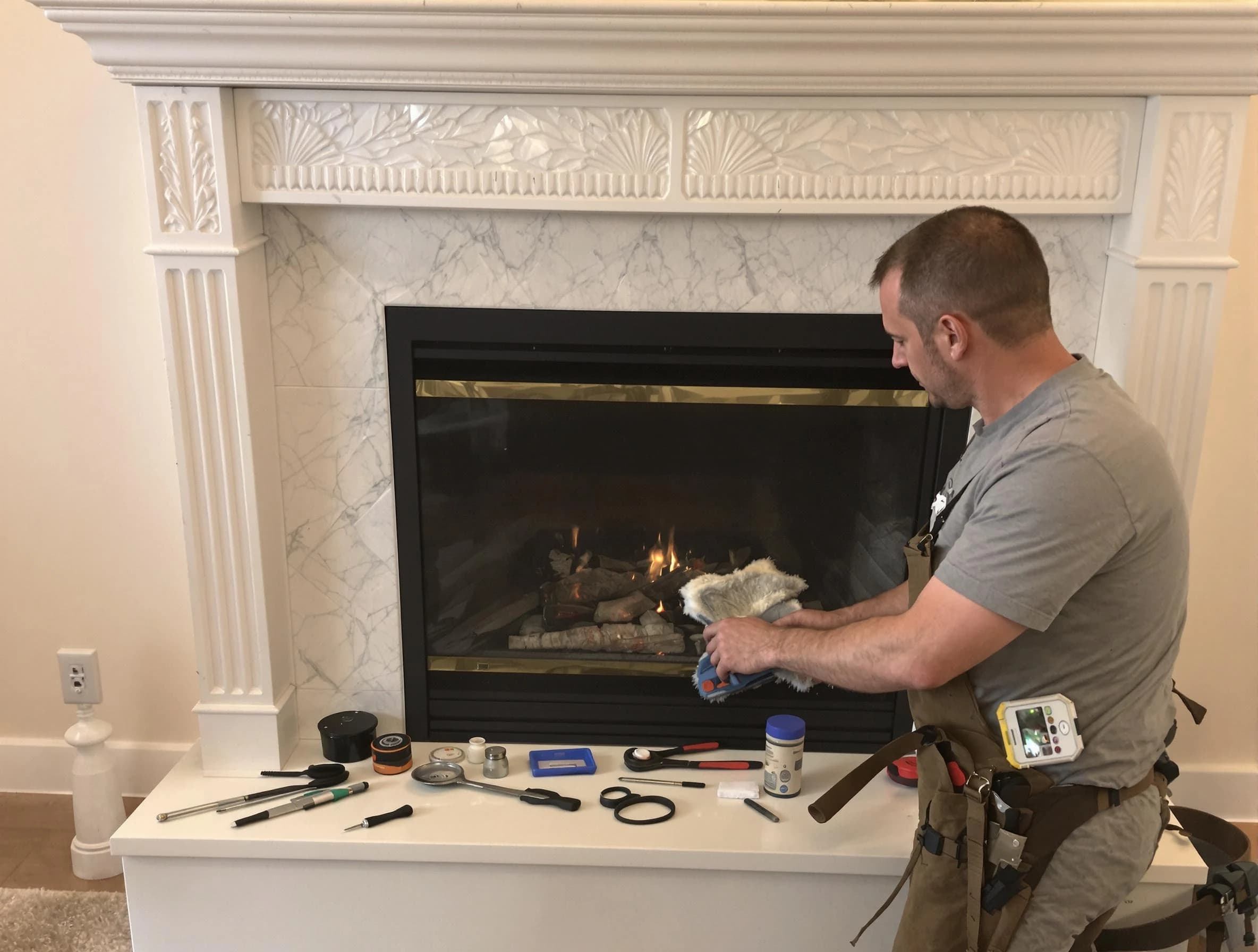 Peoria Chimney Sweep performing fireplace maintenance in Peoria, AZ
